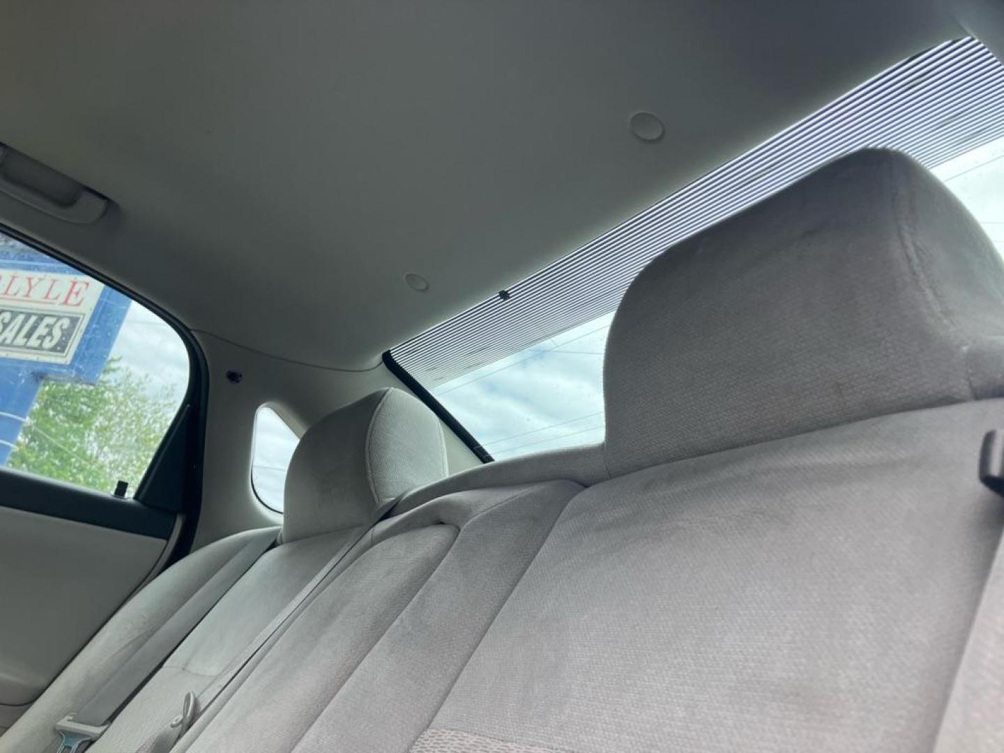 2014 BLACK CHEVROLET IMPALA LIMITED LT (2G1WB5E33E1) with an 3.6L engine, Automatic transmission, located at 1708 Broadway, Rockford, IL, 61104, (815) 397-5010, 42.252522, -89.069359 - Photo#4