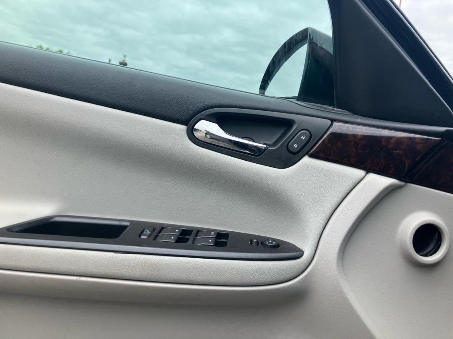 2014 BLACK CHEVROLET IMPALA LIMITED LT (2G1WB5E33E1) with an 3.6L engine, Automatic transmission, located at 1708 Broadway, Rockford, IL, 61104, (815) 397-5010, 42.252522, -89.069359 - Photo#6
