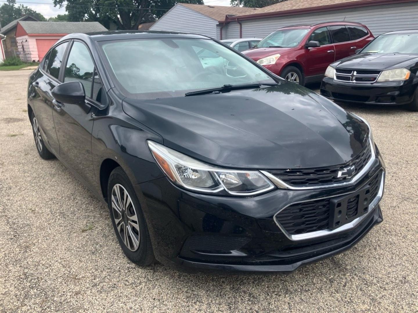 2017 BLACK CHEVROLET CRUZE LS (1G1BC5SM4H7) with an 1.4L engine, Automatic transmission, located at 1708 Broadway, Rockford, IL, 61104, (815) 397-5010, 42.252522, -89.069359- Photo#1