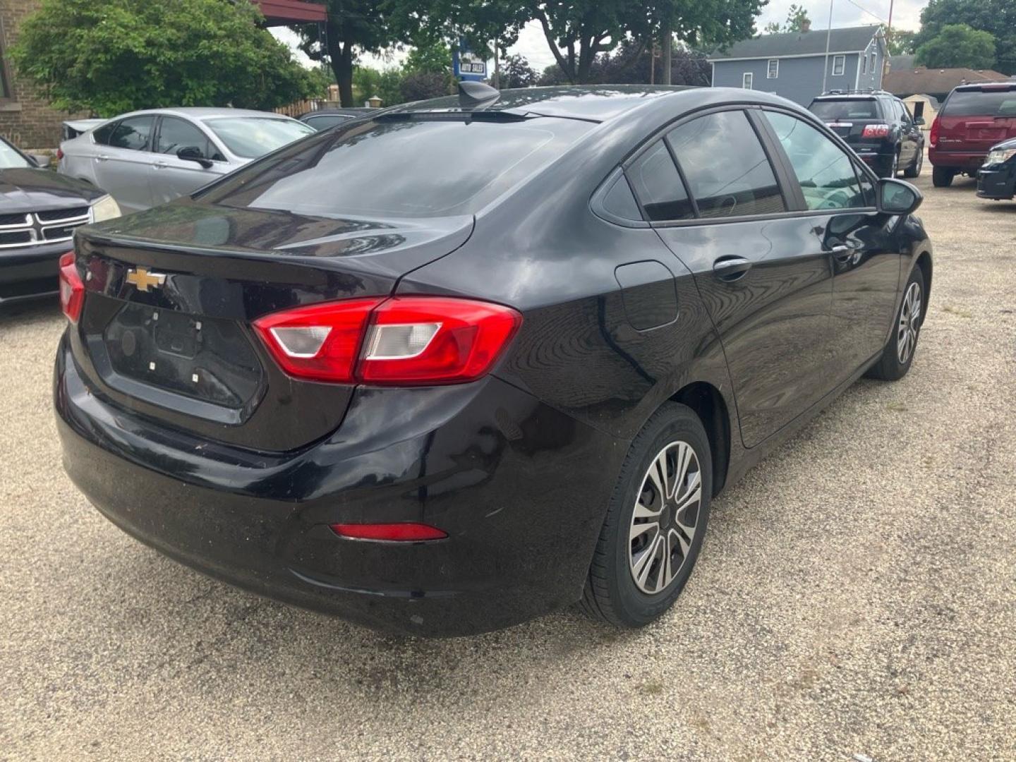 2017 BLACK CHEVROLET CRUZE LS (1G1BC5SM4H7) with an 1.4L engine, Automatic transmission, located at 1708 Broadway, Rockford, IL, 61104, (815) 397-5010, 42.252522, -89.069359- Photo#2