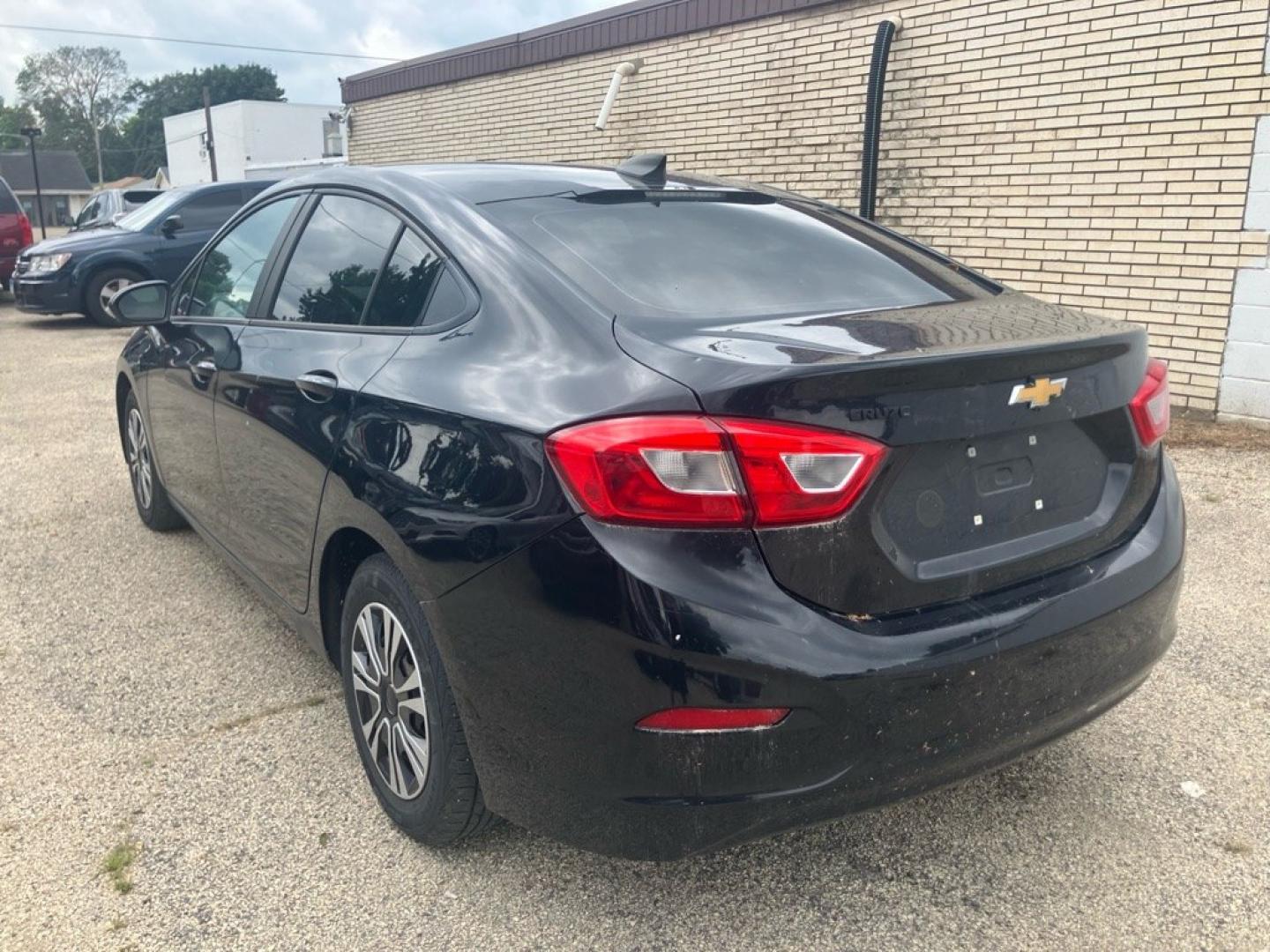 2017 BLACK CHEVROLET CRUZE LS (1G1BC5SM4H7) with an 1.4L engine, Automatic transmission, located at 1708 Broadway, Rockford, IL, 61104, (815) 397-5010, 42.252522, -89.069359- Photo#3