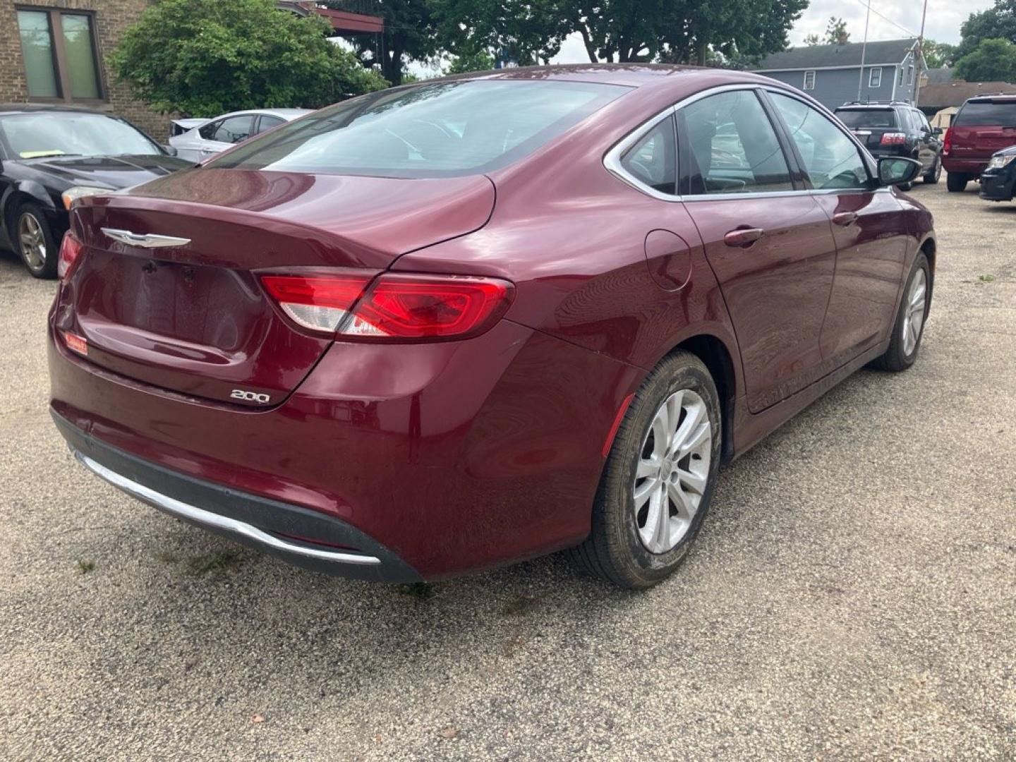 2016 RED CHRYSLER 200 LIMITED (1C3CCCAB9GN) with an 2.4L engine, Automatic transmission, located at 1708 Broadway, Rockford, IL, 61104, (815) 397-5010, 42.252522, -89.069359- Photo#2