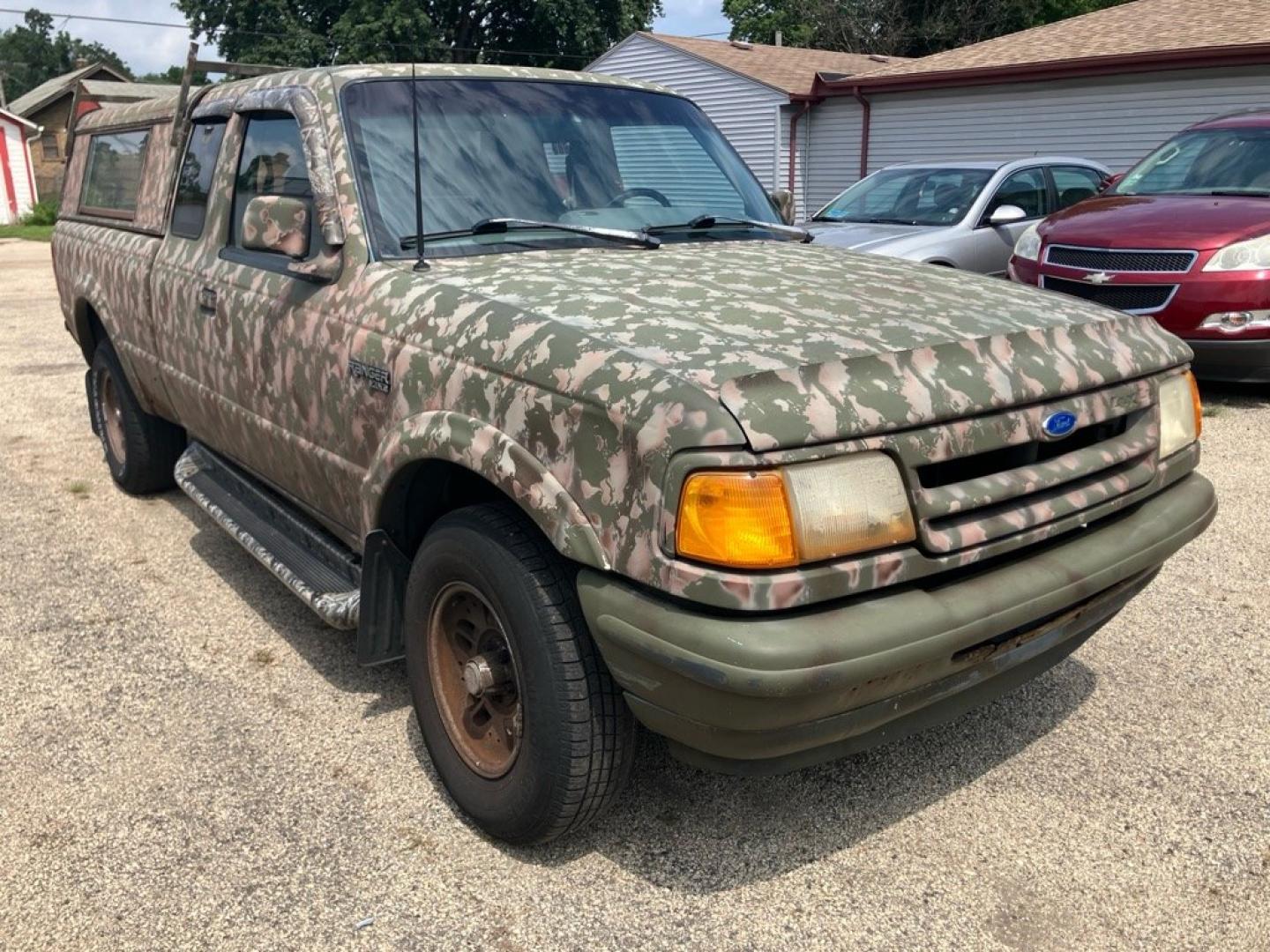 1993 CAMO FORD RANGER SUPER CAB (1FTCR15XXPP) with an 4.0L engine, 5-Speed Manual transmission, located at 1708 Broadway, Rockford, IL, 61104, (815) 397-5010, 42.252522, -89.069359- Photo#1