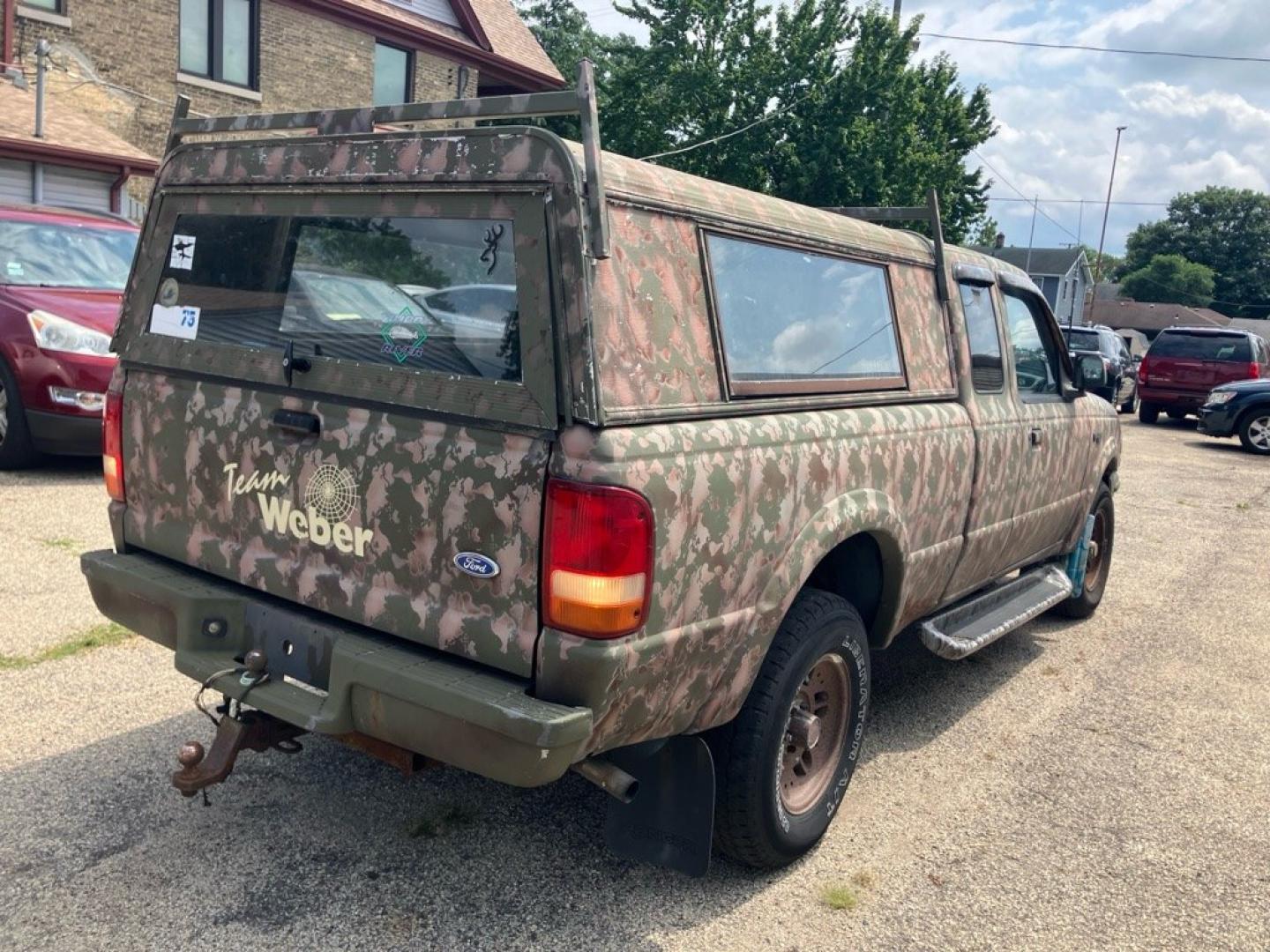 1993 CAMO FORD RANGER SUPER CAB (1FTCR15XXPP) with an 4.0L engine, 5-Speed Manual transmission, located at 1708 Broadway, Rockford, IL, 61104, (815) 397-5010, 42.252522, -89.069359- Photo#2