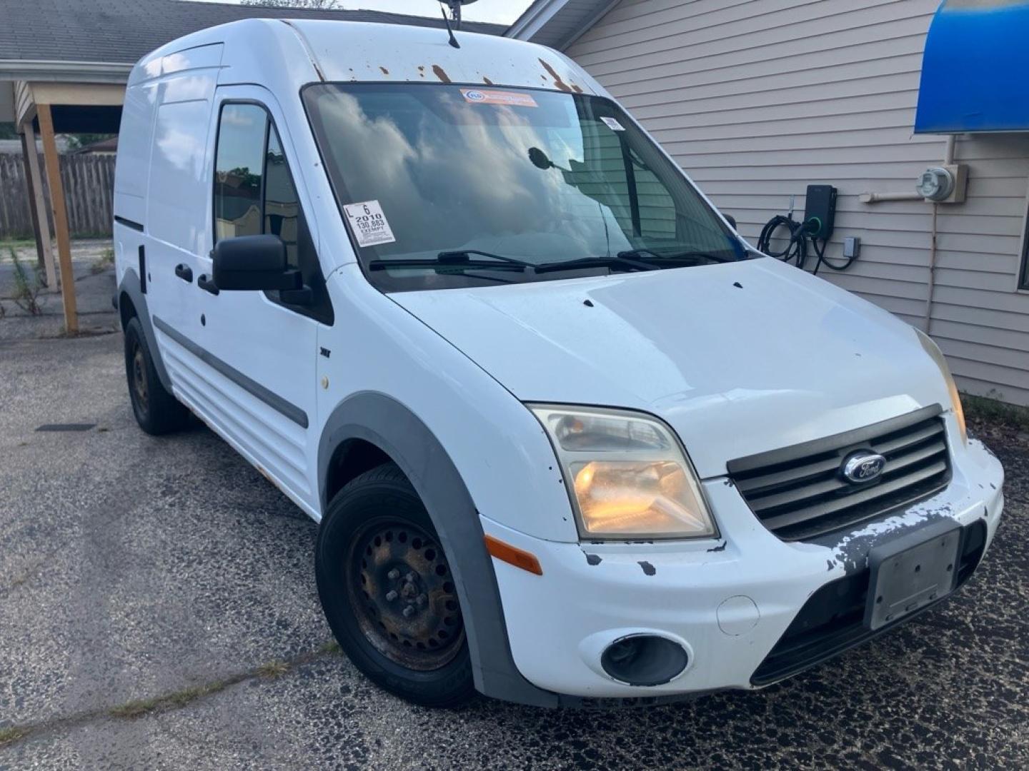 2010 WHITE FORD TRANSIT CONNECT XLT (NM0LS7BN8AT) with an 2.0L engine, Automatic transmission, located at 1708 Broadway, Rockford, IL, 61104, (815) 397-5010, 42.252522, -89.069359- Photo#1