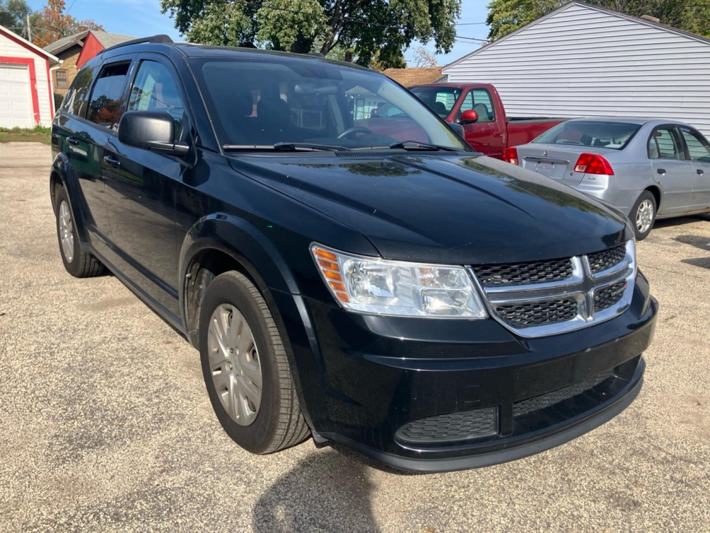 2017 BLACK DODGE JOURNEY SE (3C4PDCAB5HT) with an 2.4L engine, Automatic transmission, located at 1708 Broadway, Rockford, IL, 61104, (815) 397-5010, 42.252522, -89.069359- Photo#1