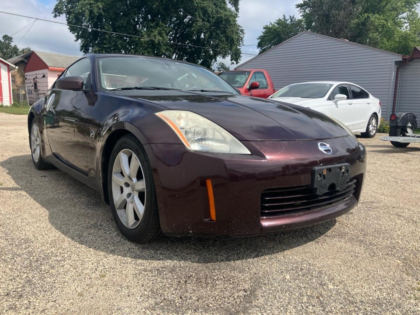 2003 BURGUN NISSAN 350Z COUPE (JN1AZ34D93T) with an 3.5L engine, 6-Speed Manual transmission, located at 1708 Broadway, Rockford, IL, 61104, (815) 397-5010, 42.252522, -89.069359- Photo#0