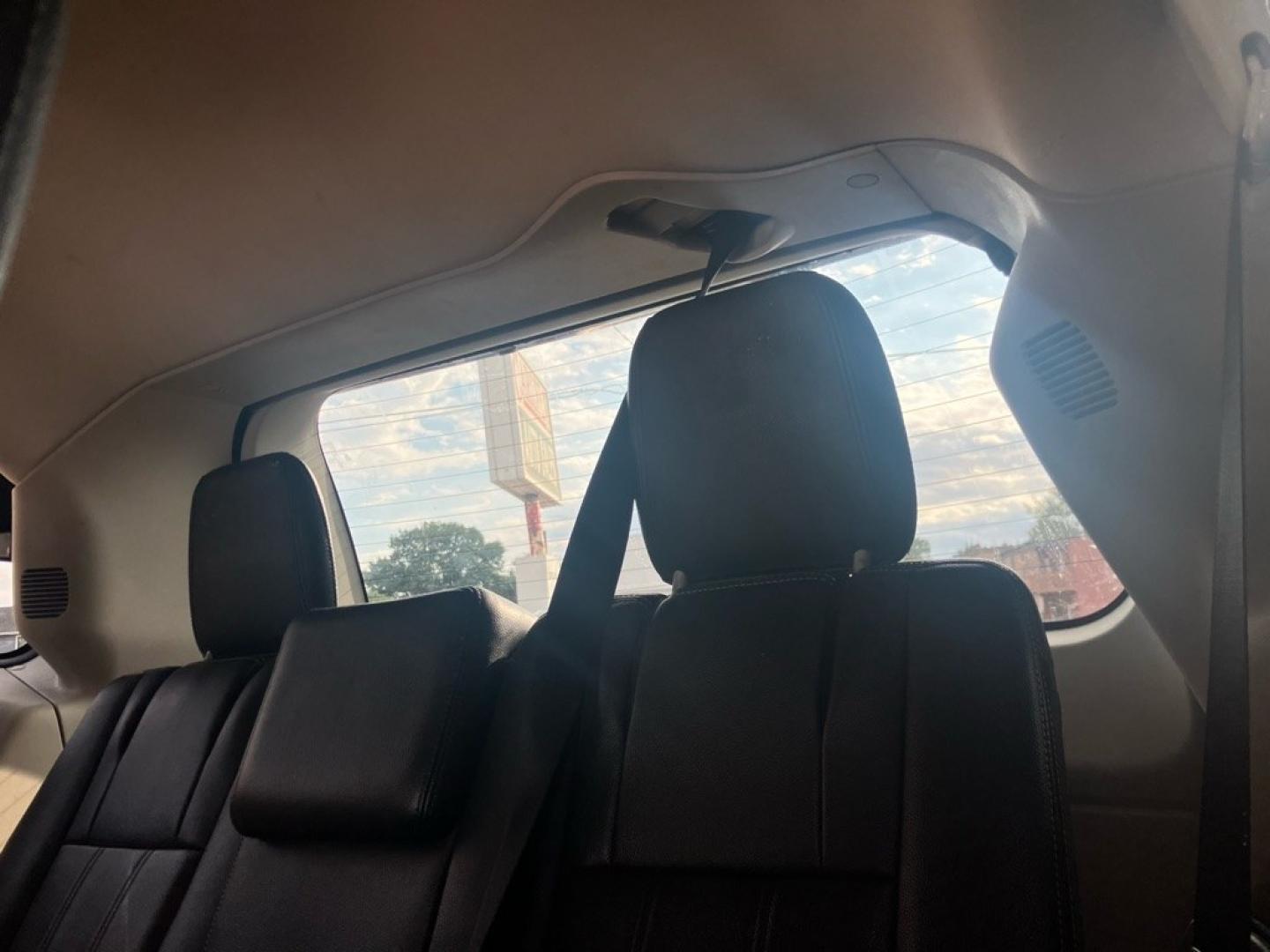 2013 BLACK CHRYSLER TOWN and COUNTRY TOURING (2C4RC1BG7DR) with an 3.6L engine, Automatic transmission, located at 1708 Broadway, Rockford, IL, 61104, (815) 397-5010, 42.252522, -89.069359- Photo#4