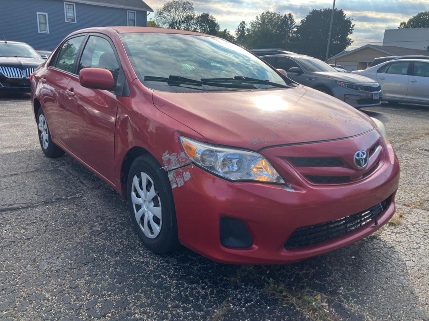 2011 RED TOYOTA COROLLA BASE (2T1BU4EE0BC) with an 1.8L engine, Automatic transmission, located at 1708 Broadway, Rockford, IL, 61104, (815) 397-5010, 42.252522, -89.069359- Photo#1