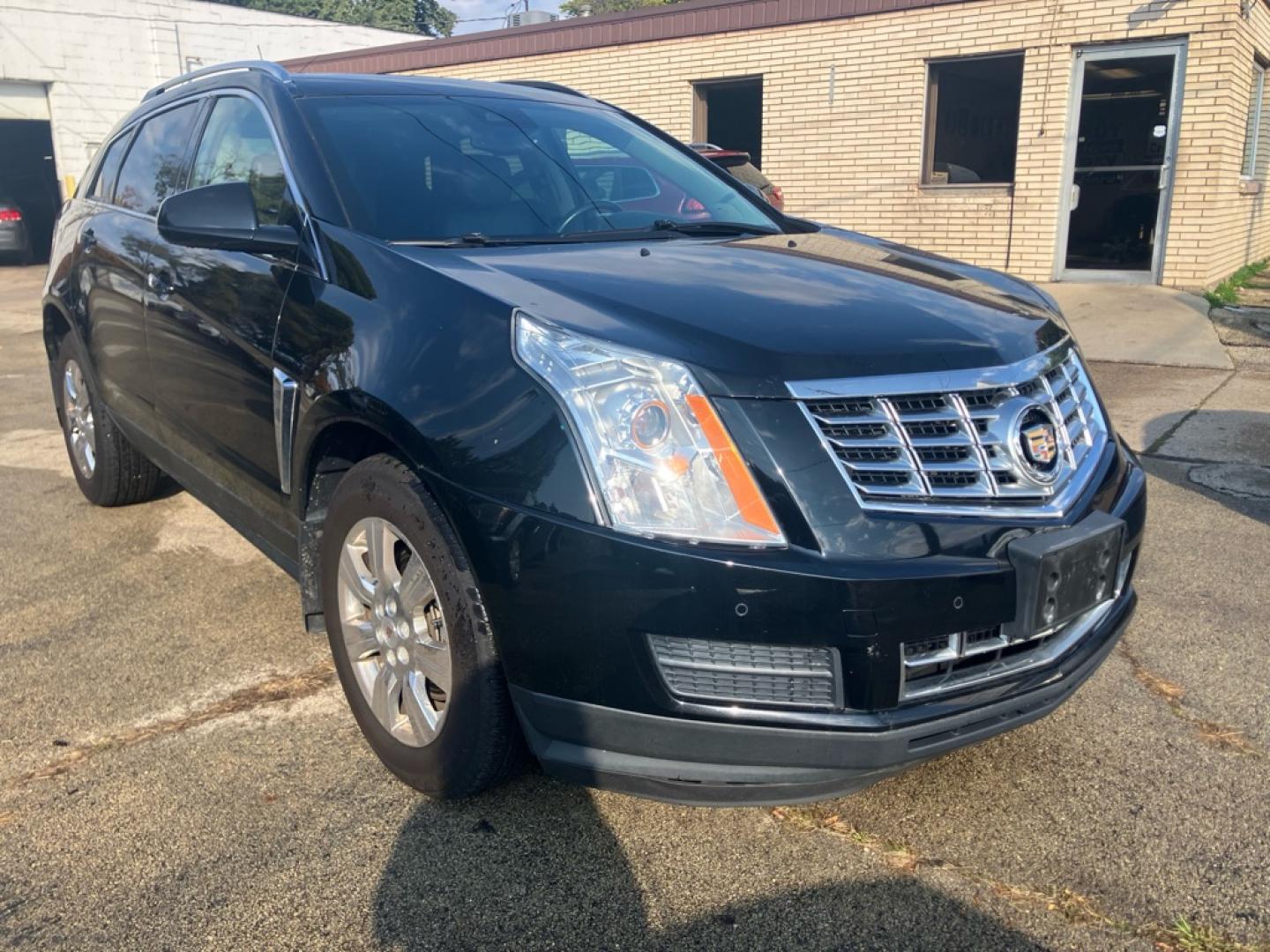 2014 BLACK CADILLAC SRX LUXURY COLLECTION (3GYFNEE39ES) with an 3.6L engine, Automatic transmission, located at 1708 Broadway, Rockford, IL, 61104, (815) 397-5010, 42.252522, -89.069359- Photo#1