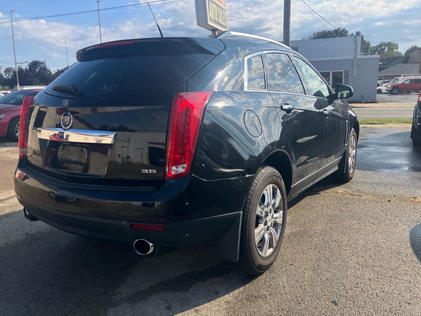 2014 BLACK CADILLAC SRX LUXURY COLLECTION (3GYFNEE39ES) with an 3.6L engine, Automatic transmission, located at 1708 Broadway, Rockford, IL, 61104, (815) 397-5010, 42.252522, -89.069359- Photo#2