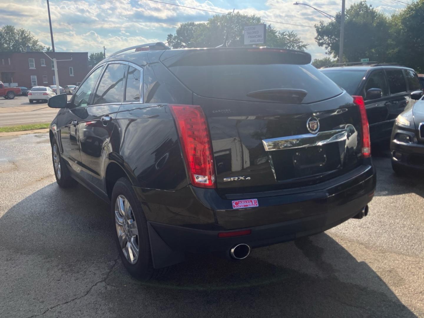 2014 BLACK CADILLAC SRX LUXURY COLLECTION (3GYFNEE39ES) with an 3.6L engine, Automatic transmission, located at 1708 Broadway, Rockford, IL, 61104, (815) 397-5010, 42.252522, -89.069359- Photo#3