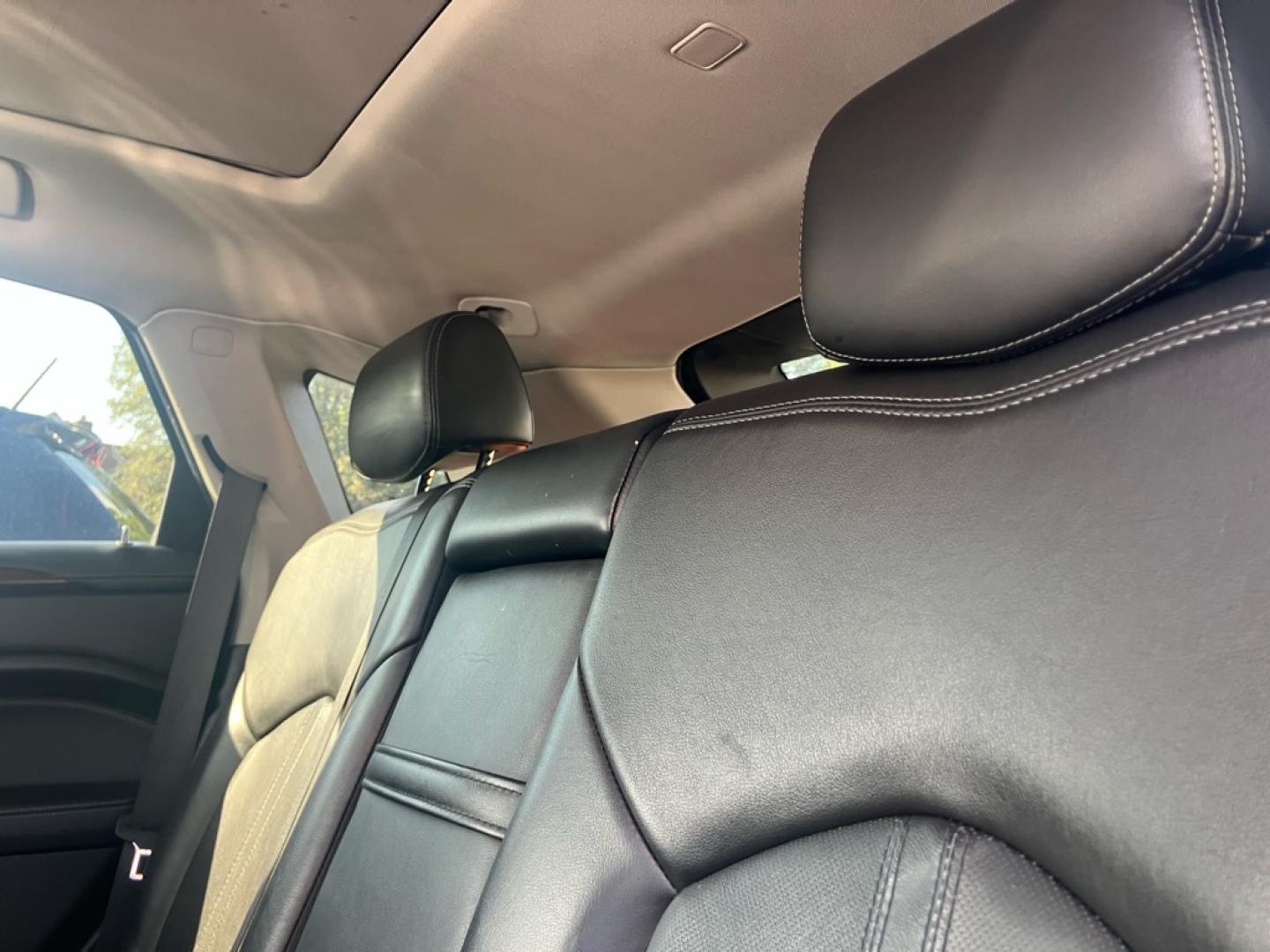 2014 BLACK CADILLAC SRX LUXURY COLLECTION (3GYFNEE39ES) with an 3.6L engine, Automatic transmission, located at 1708 Broadway, Rockford, IL, 61104, (815) 397-5010, 42.252522, -89.069359- Photo#4