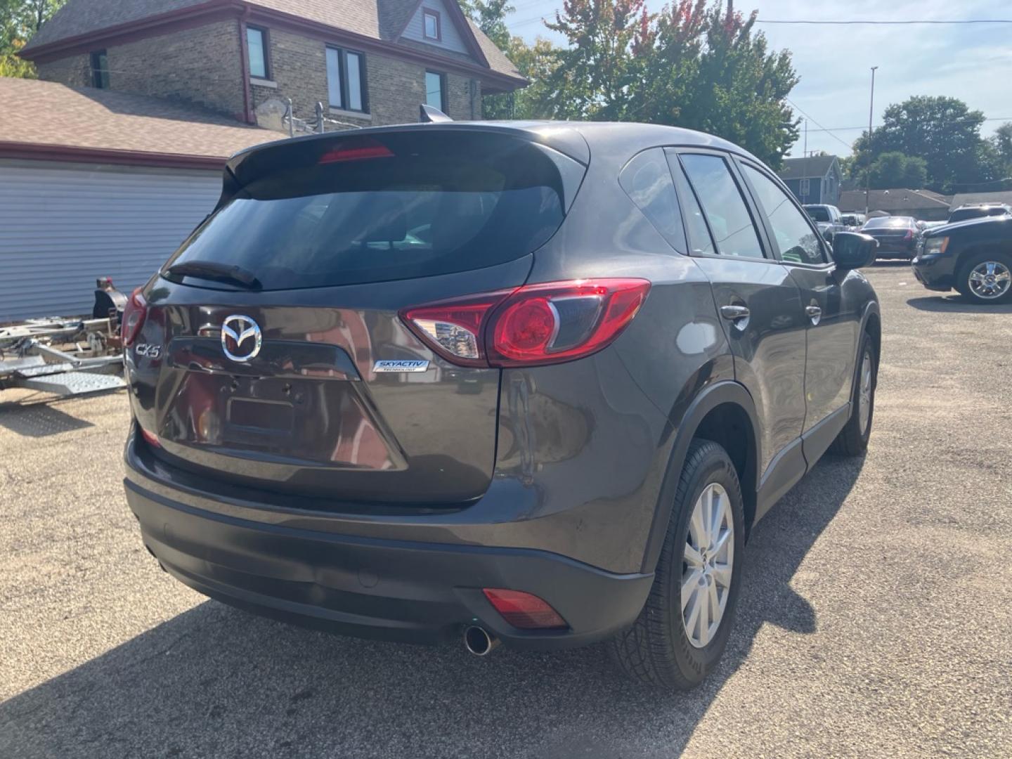 2016 BROWN MAZDA CX-5 SPORT (JM3KE2BYXG0) with an 2.5L engine, Automatic transmission, located at 1708 Broadway, Rockford, IL, 61104, (815) 397-5010, 42.252522, -89.069359- Photo#2