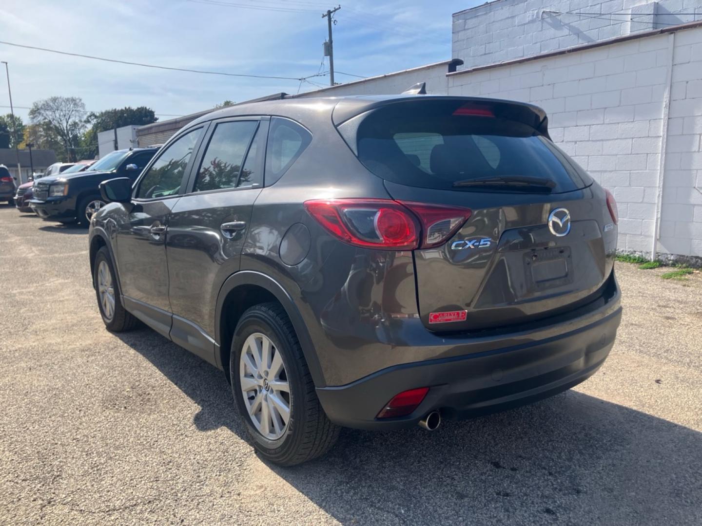 2016 BROWN MAZDA CX-5 SPORT (JM3KE2BYXG0) with an 2.5L engine, Automatic transmission, located at 1708 Broadway, Rockford, IL, 61104, (815) 397-5010, 42.252522, -89.069359- Photo#3