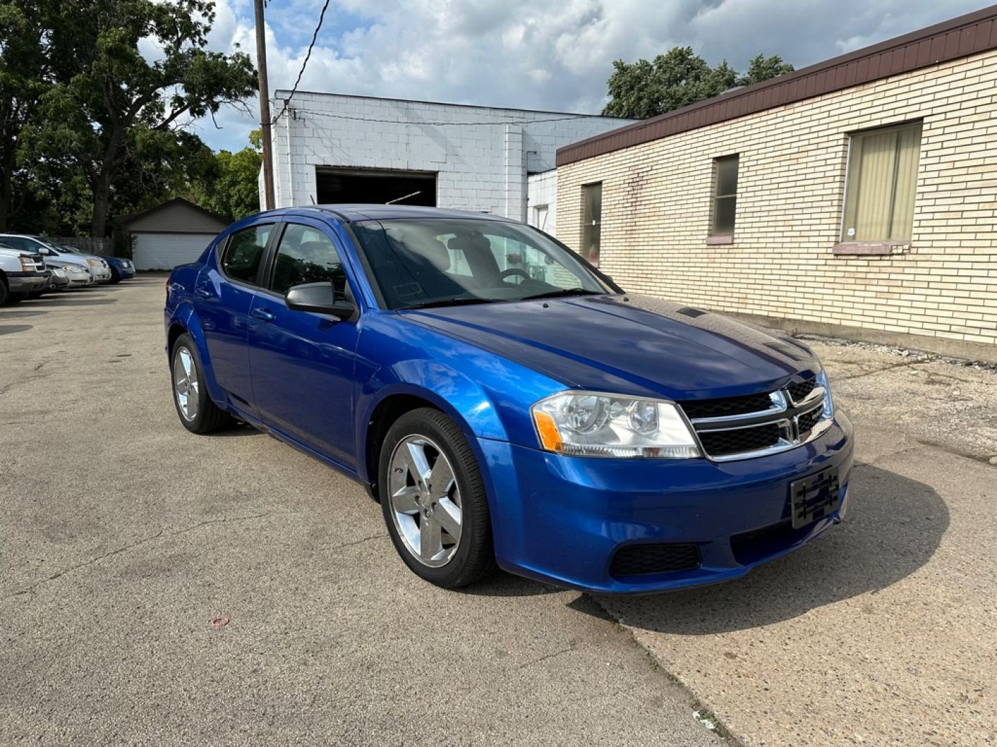 2013 BLUE DODGE AVENGER SE (1C3CDZAB0DN) with an 2.4L engine, Automatic transmission, located at 1708 Broadway, Rockford, IL, 61104, (815) 397-5010, 42.252522, -89.069359- Photo#1