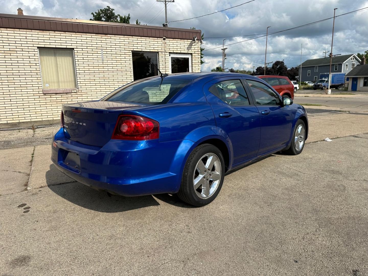2013 BLUE DODGE AVENGER SE (1C3CDZAB0DN) with an 2.4L engine, Automatic transmission, located at 1708 Broadway, Rockford, IL, 61104, (815) 397-5010, 42.252522, -89.069359- Photo#2